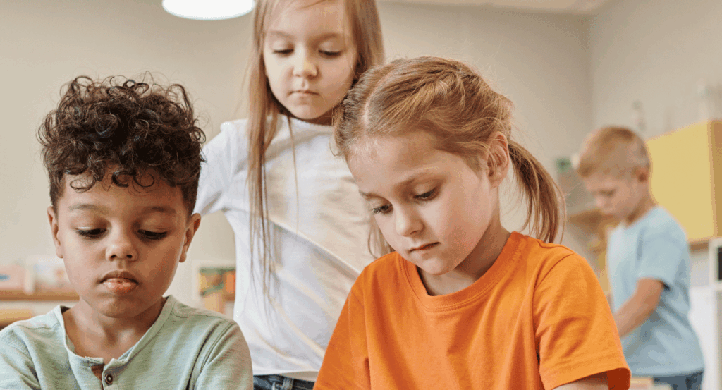 preschool students work on a project